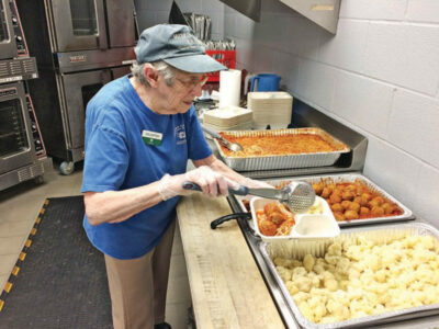 older adult volunteer community meal