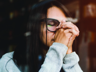 WOMAN PRAYING