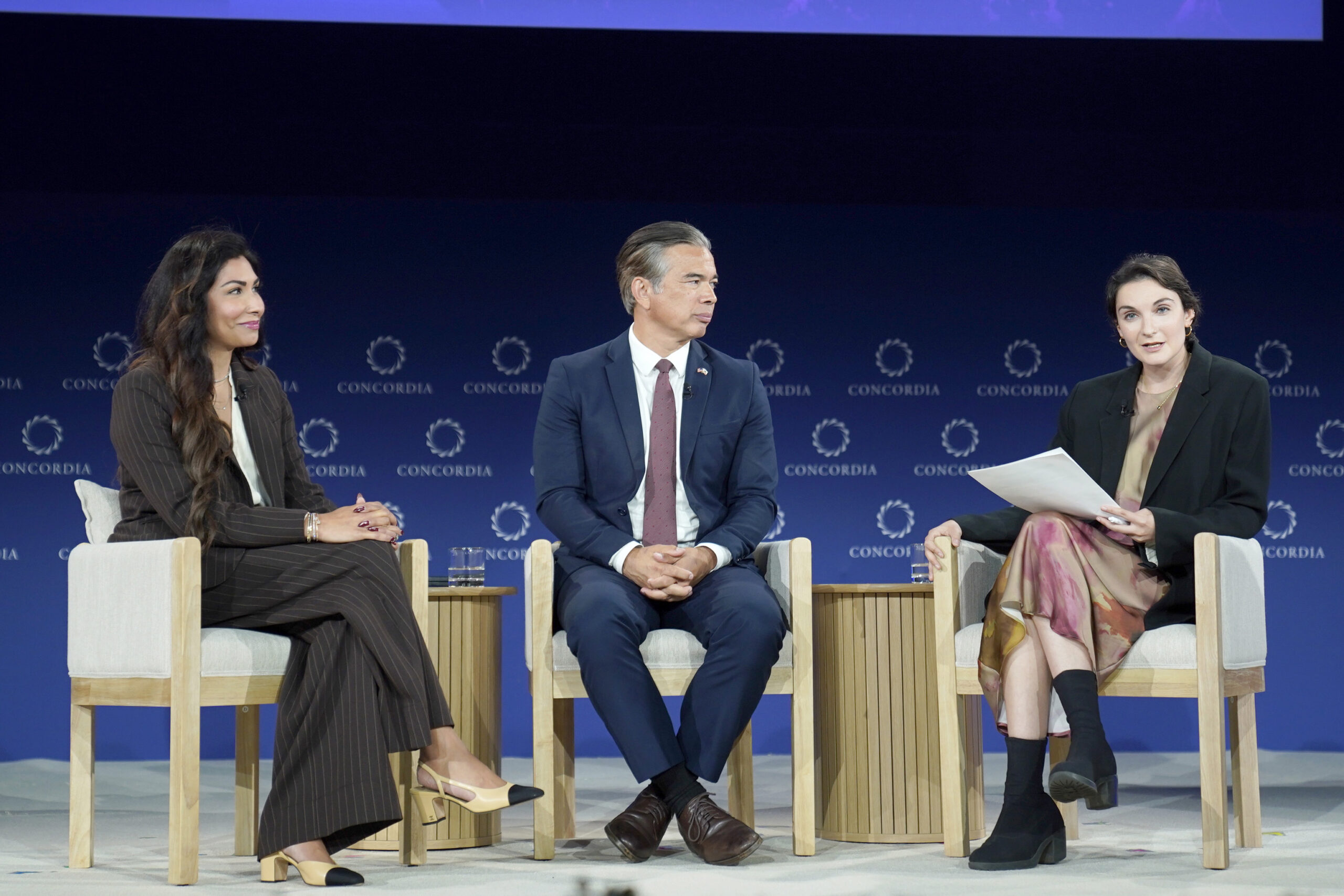 panelists sit and discuss affordable housing