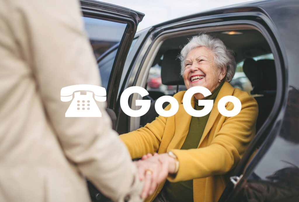woman getting out of car with GO GO logo